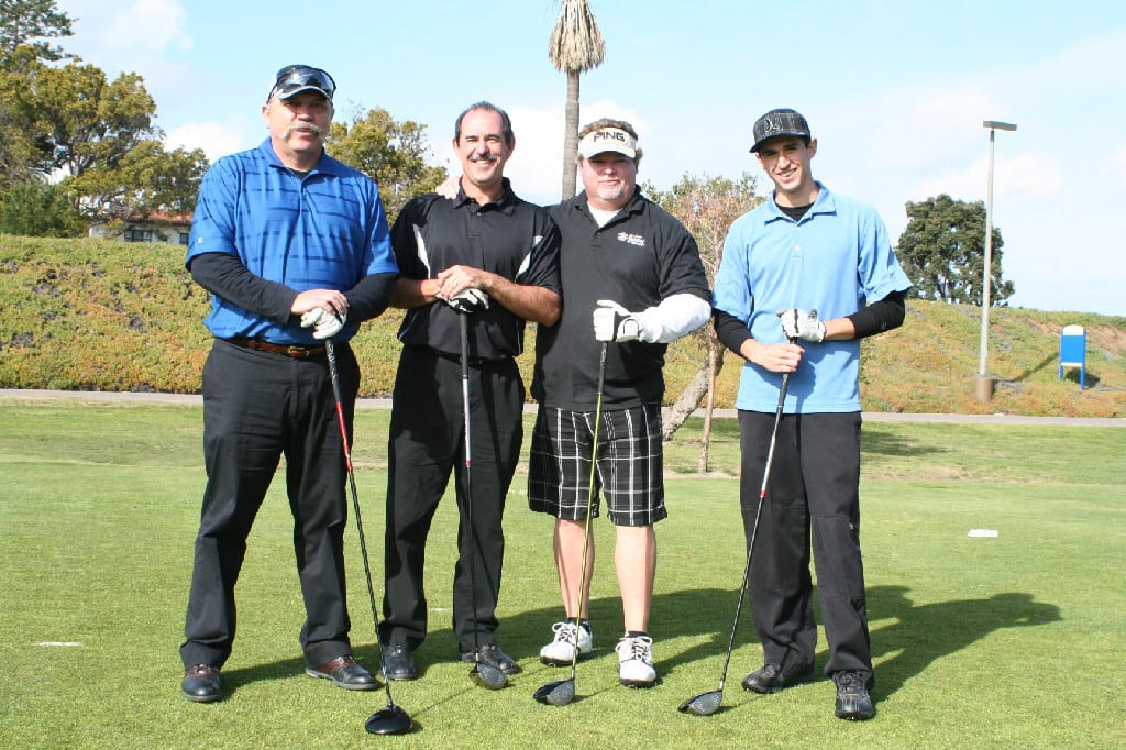 A Team of Four Golfers Assembled for Photoshoot