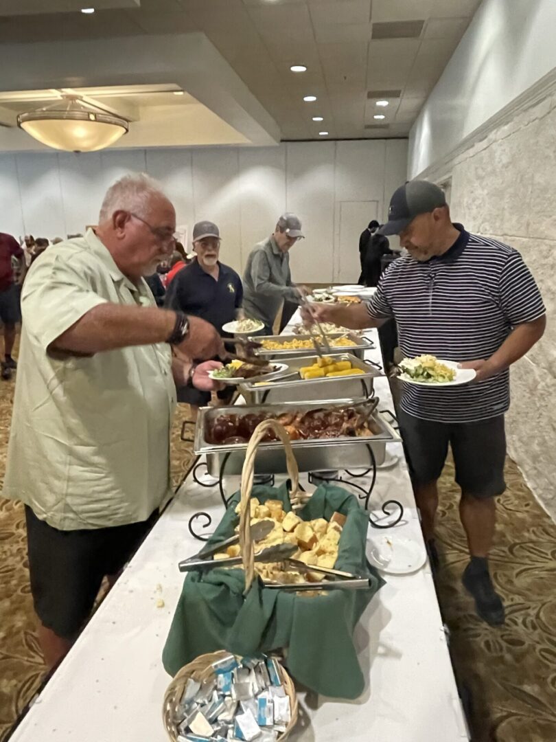 Golfers at the Annual Golf Tournament, Filling their Plates at Buffett for the Meal