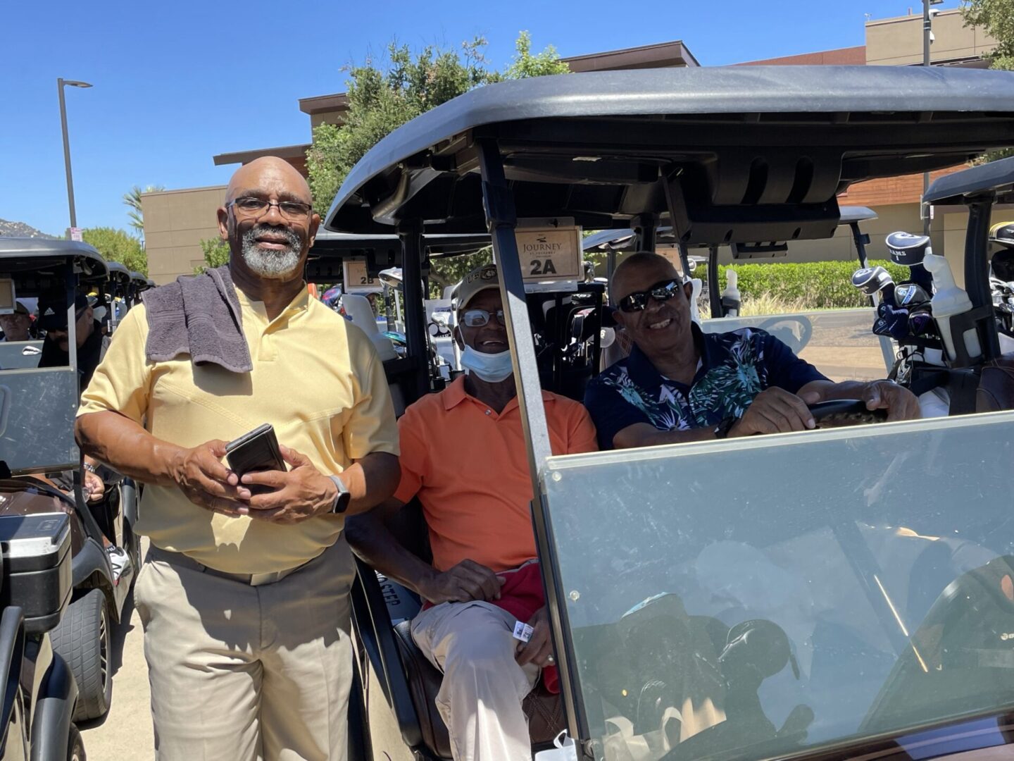 Ted W Photographed with Other Golfers at the Tournament