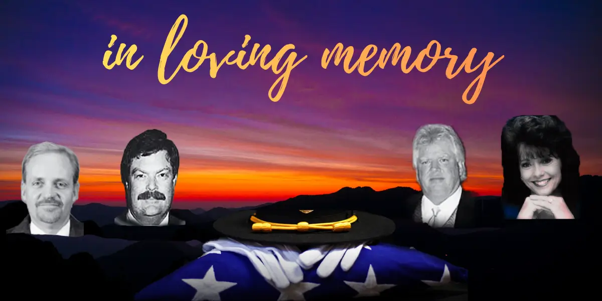 In loving memory with sunset background.